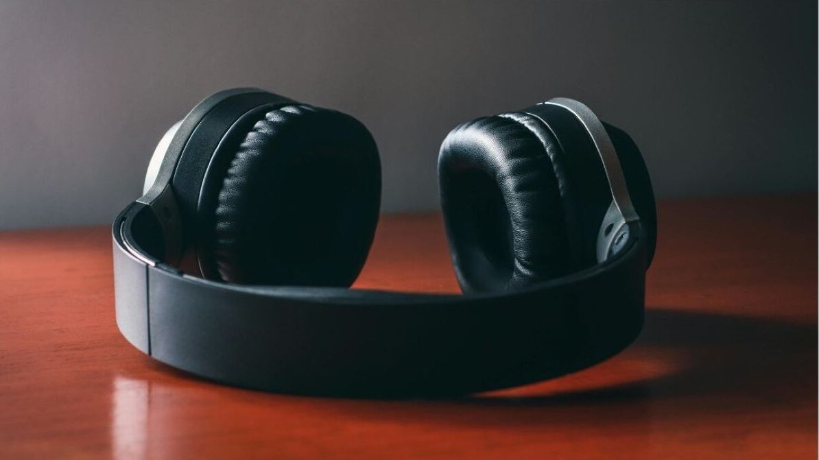 Over-ear headphones resting on a table