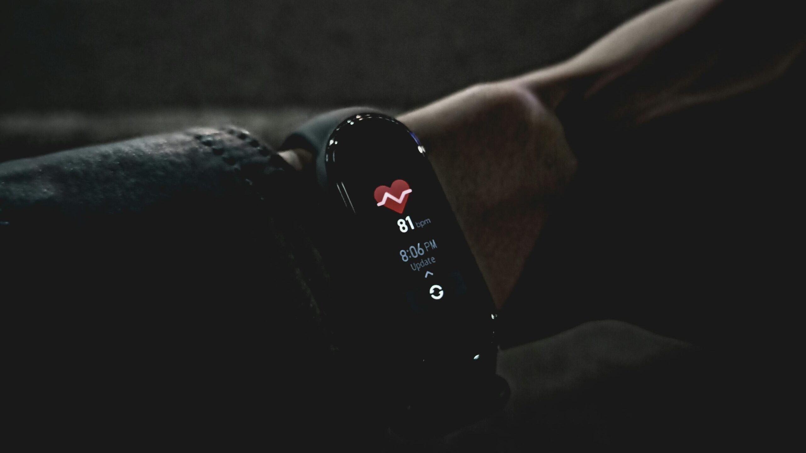  Fitness tracker on a runner’s wrist showing step count.